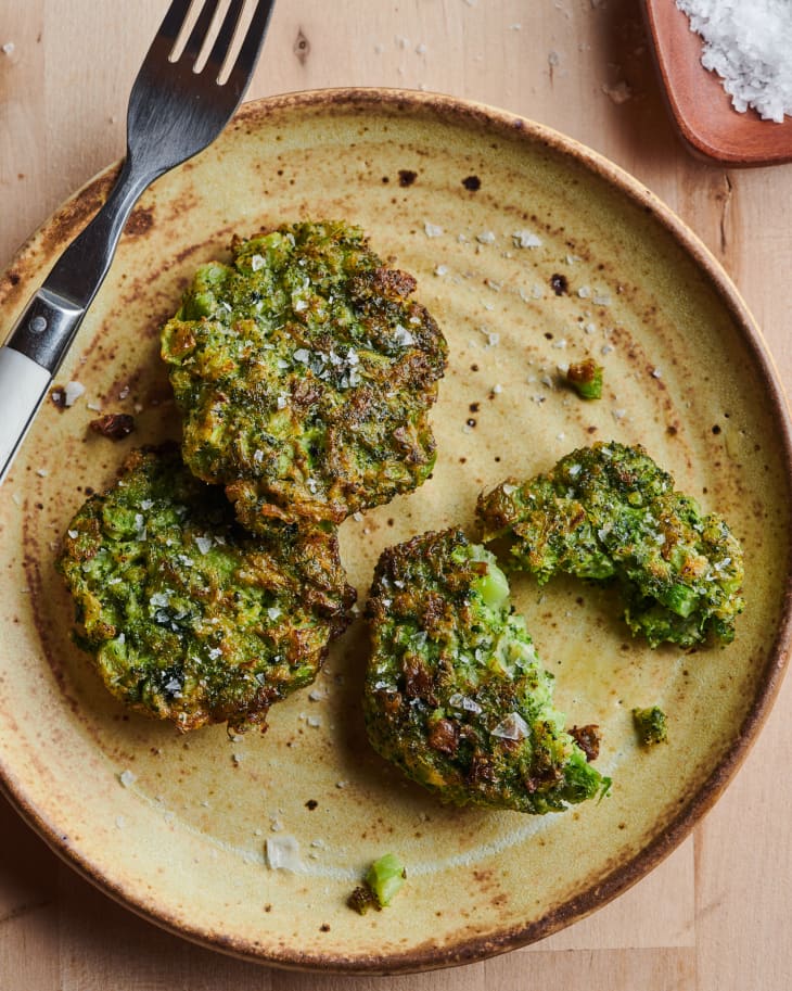Two ingredient broccoli fritters on ceramic plate.