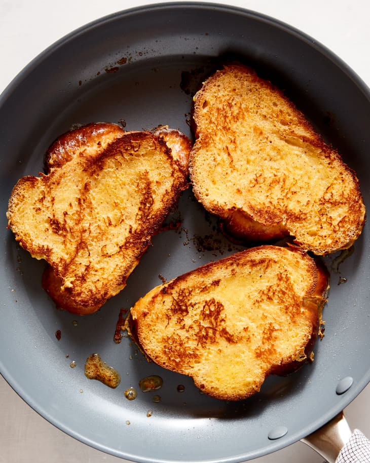 French toast is cooked in a nonstick pan.