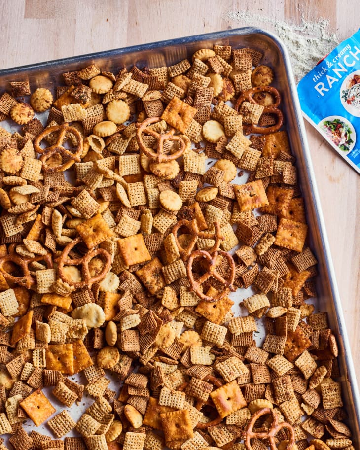 close up of finished ranch chex mix in baking pan