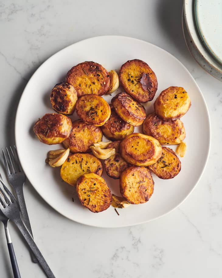 melting potatoes finished on a plate with silverware