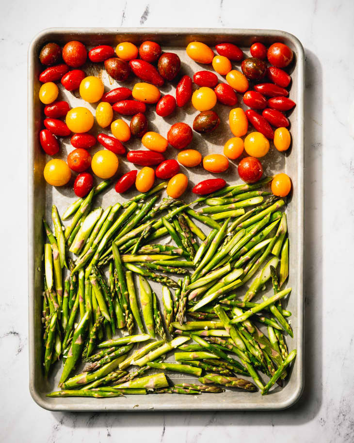 tomatoes and veggies on baking pan