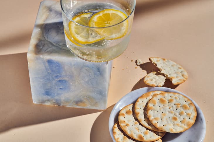 water crackers on a marble surface with water