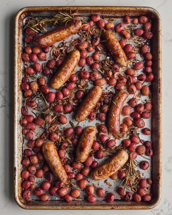 sausage and grapes on a sheet pan