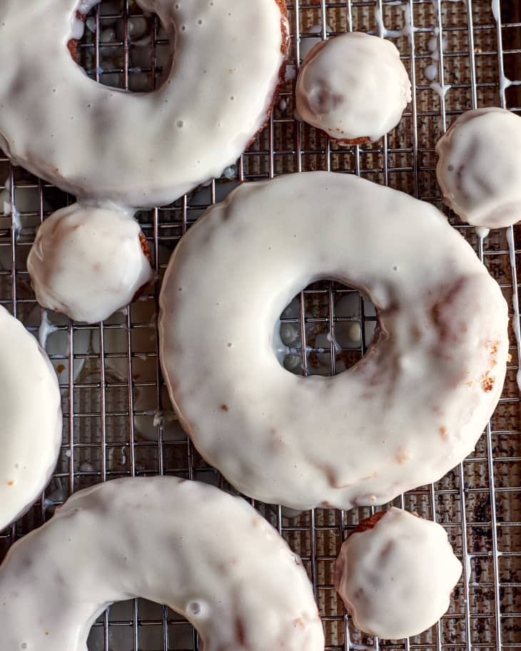 sour cream doughnuts on a cooling rack