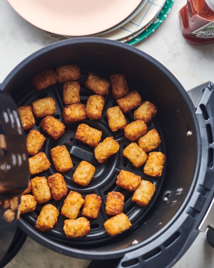 tater tots in base of air fryer