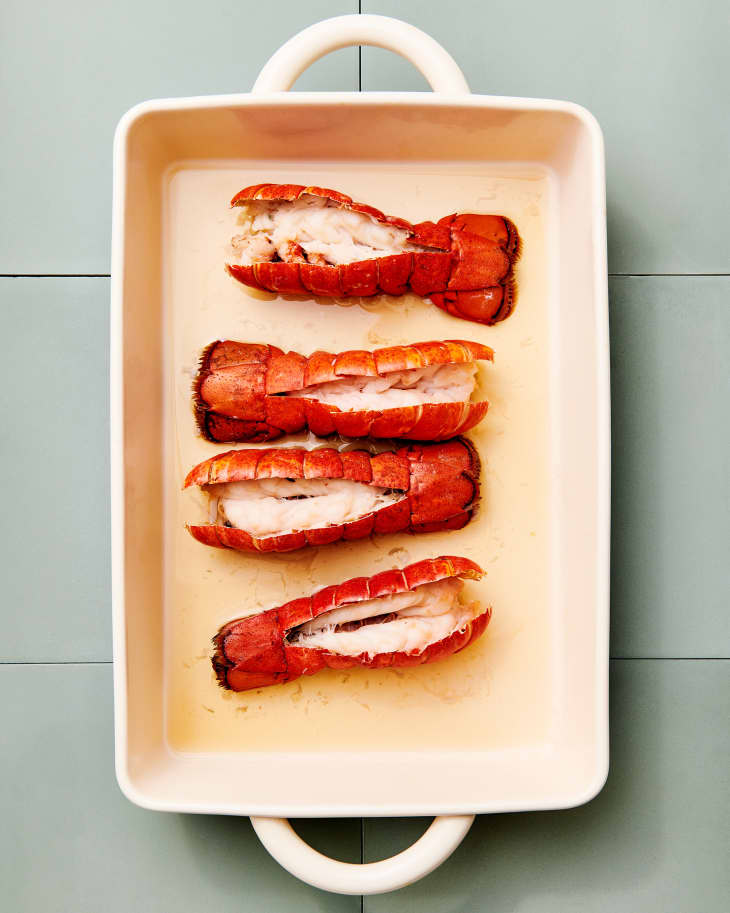 cooked lobster tails in a pan