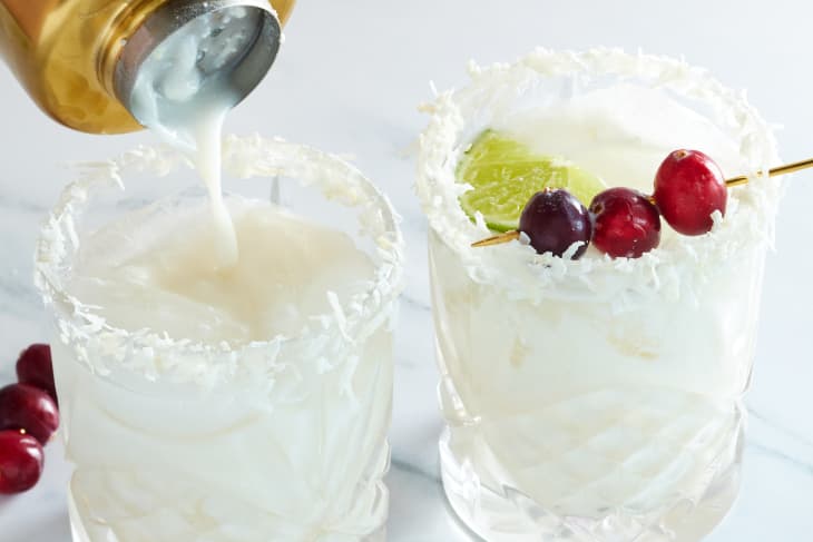 margarita with cherries and lime garnish in glasses