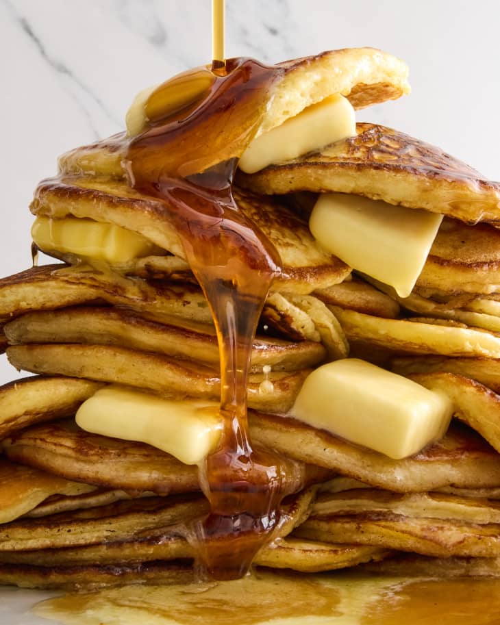 pancakes in a stack with butter and syrup
