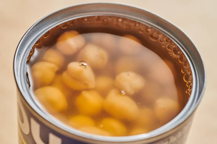 Chickpeas in an open can.