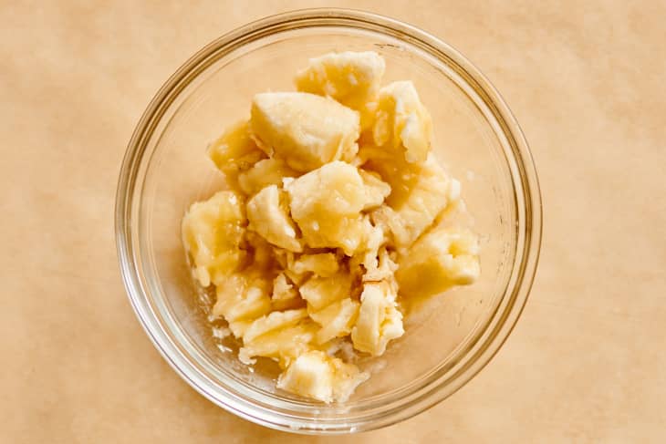 Mashed bananas in a small bowl.