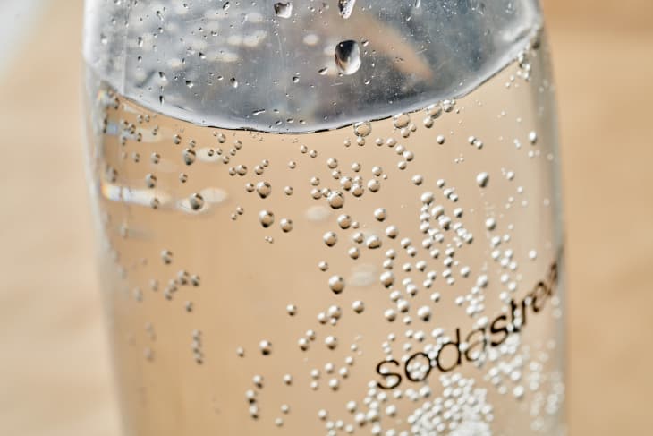 Bubbly water in a bottle labeled "sodastream"