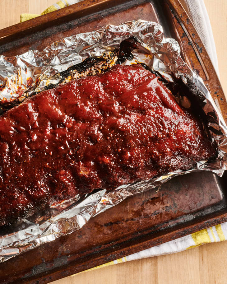 rack of ribs on a baking sheet