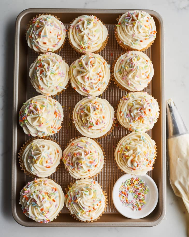 cupcakes line up on sheet pan