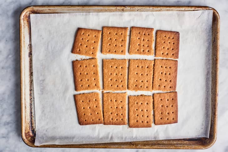 graham crackers sliced on parchment paper