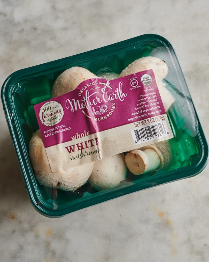 mushrooms in a plastic container