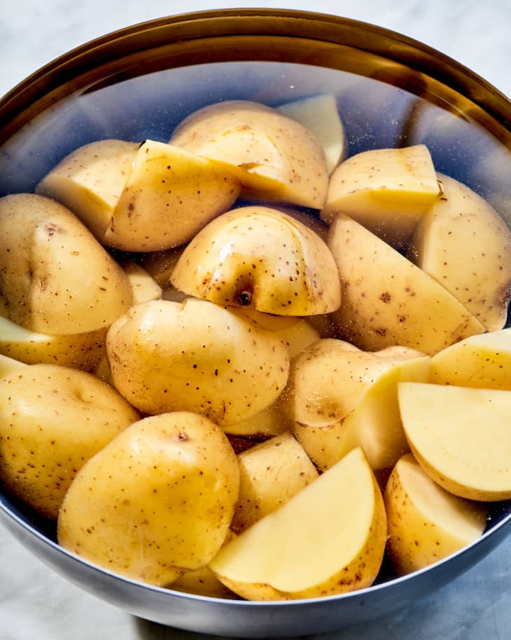 cut potatoes soaking in water