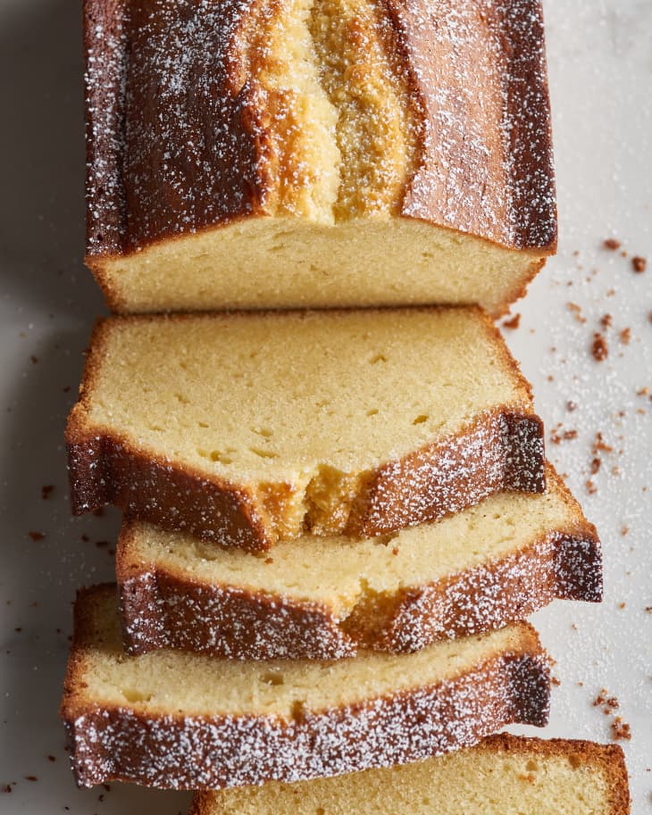loaf of pound cake with slices falling off