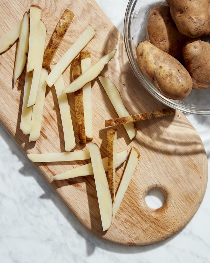 potato spears on a cutting board