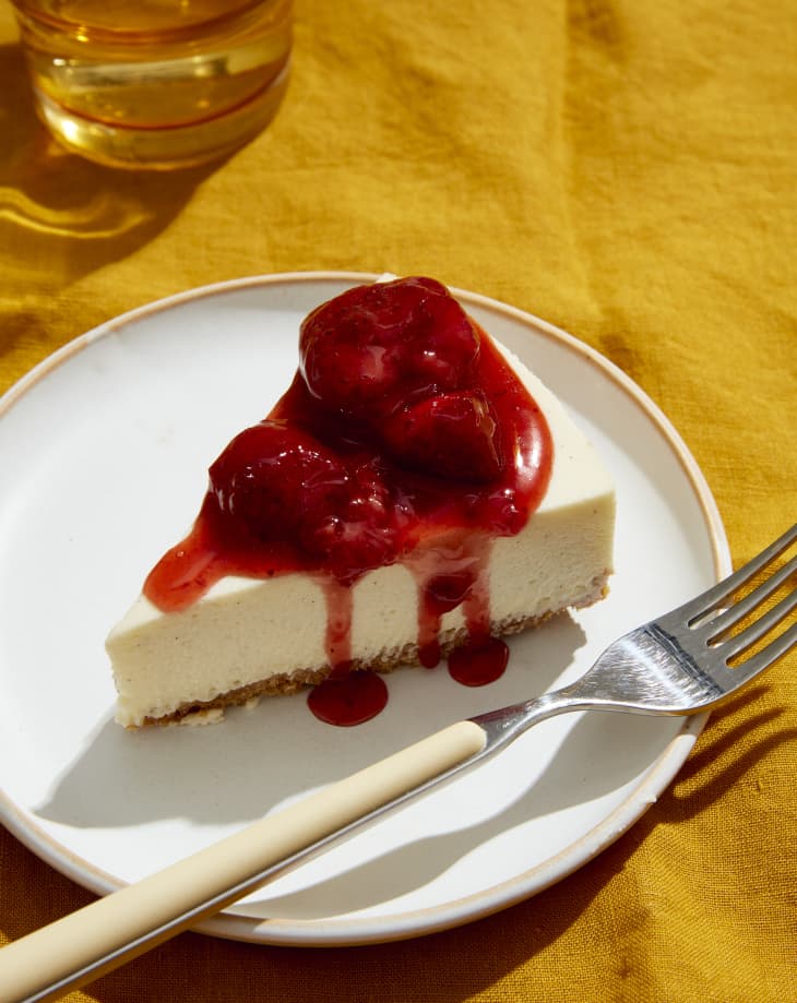 cheesecake with strawberry topping on plate