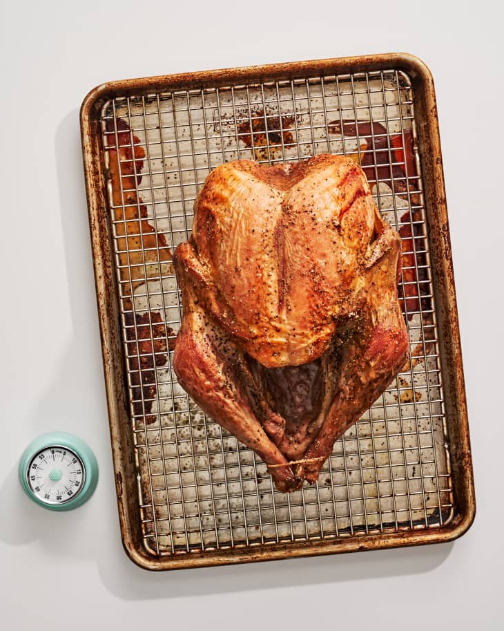 turkey with cooking method near it on baking rack