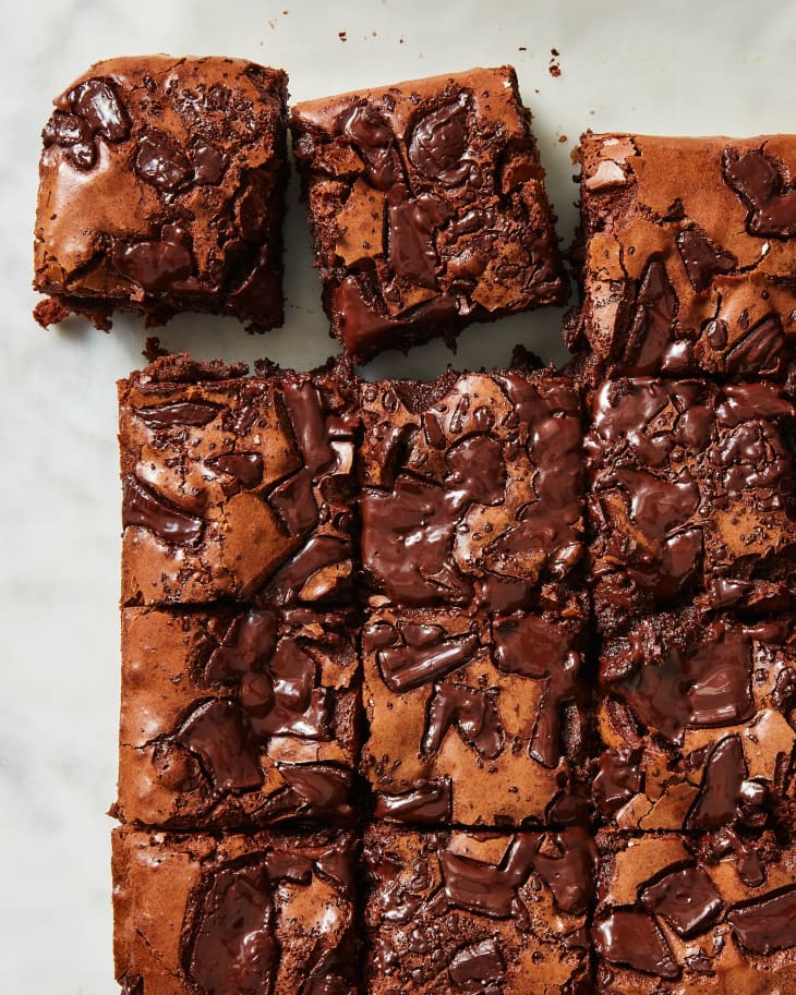 Overhead photo of Bigger Bolder Baking's chewy brownies on a marble surface