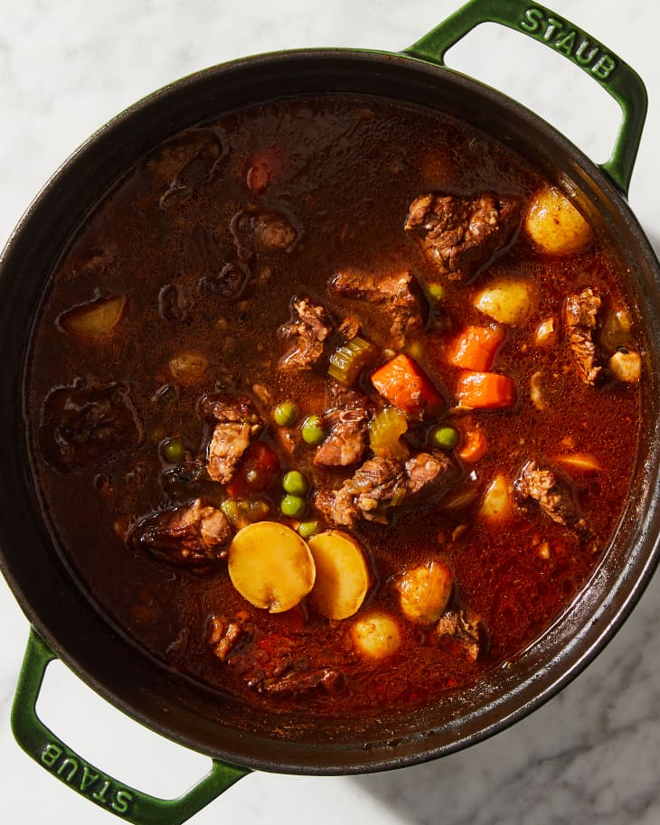 beef stew in a pot on marble