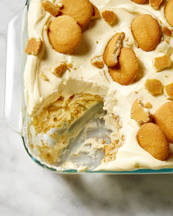 A close up of Magnolia bakery's recipe for banana pudding with a scoop taken out