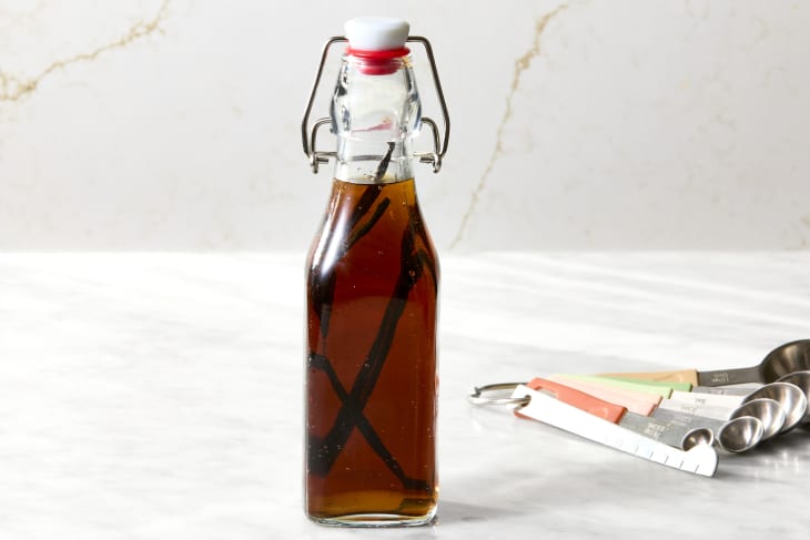 shot of finished vanilla extract in a bottle.