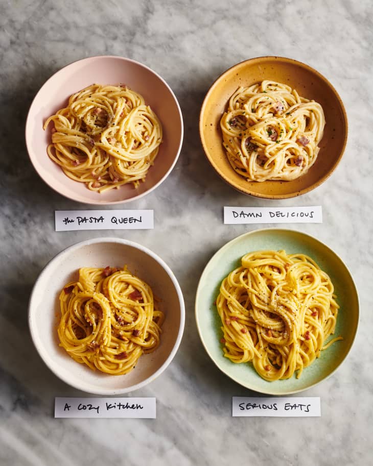 four labeled bowls of pasta carbonara