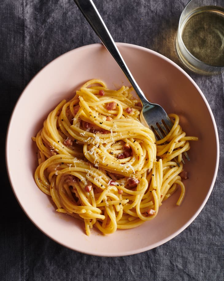 a bowl of pasta carbonara