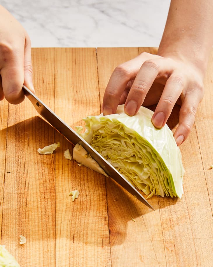 Depiction of the instructions in How to Cut and Shred Cabbage with a Knife step 5
