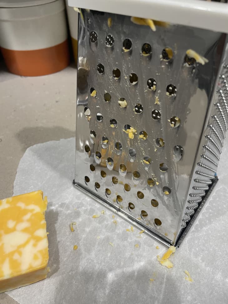 Cheese grater hack with cooking spray