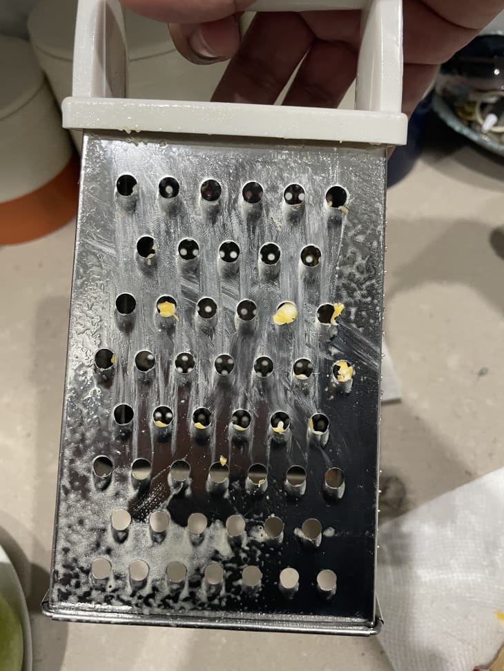 Cheese grater hack with cooking spray