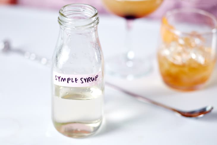 Labeled bottle of clear, unflavored simple syrup