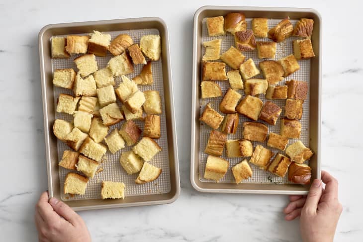 A photo of bread cubes in a baking sheet toasted before and after