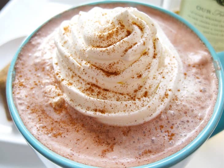 A close-up photo of the whipped cream made with whipping cream, powdered sugar, vanilla extract, and cocoa powder