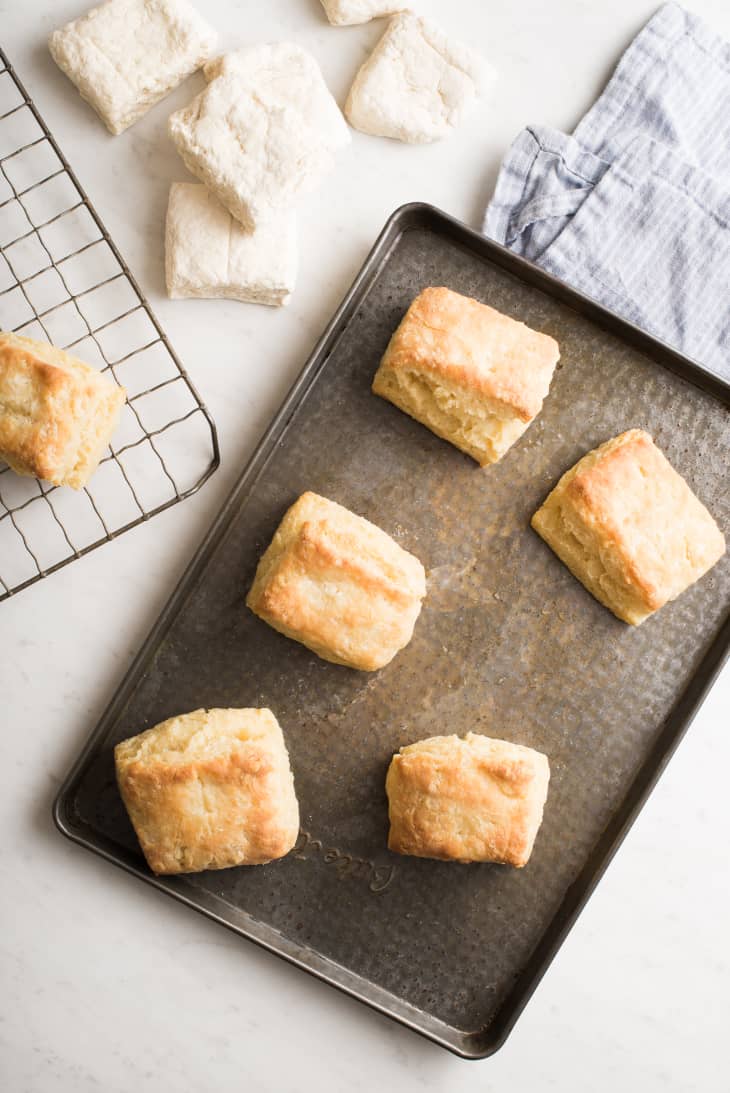 Baked buttermilk biscuits on a sheet pan
