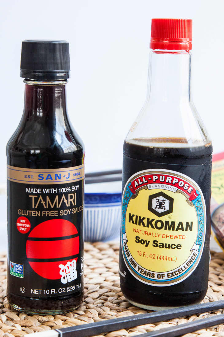 A bottle of San-J Tamari and Kikkoman soy sauce side by side