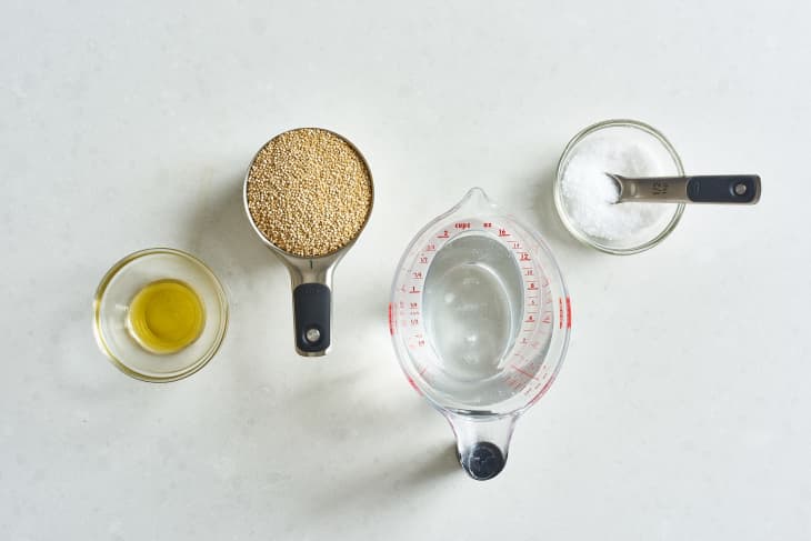 Ingredients for cooking quinoa: dried quinoa, water, olive oil, and salt
