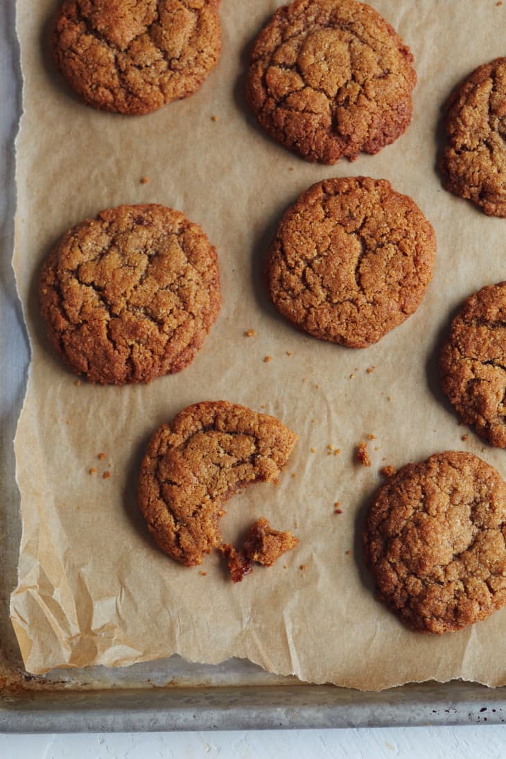 Graham cracker cookies over parchment paper on a baking tray