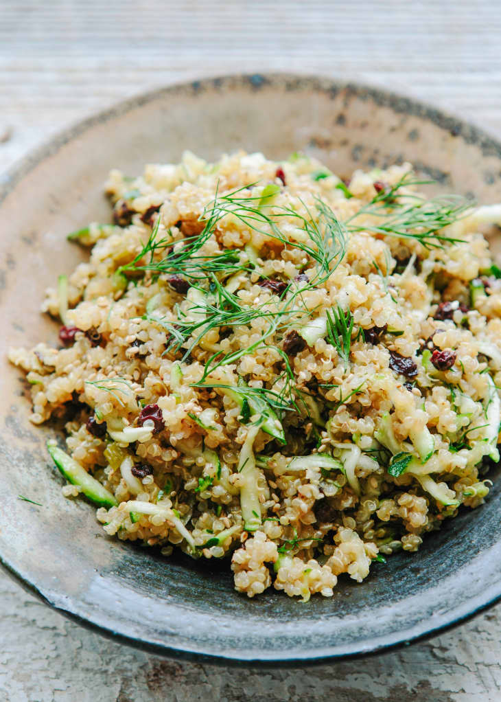 Lemon Quinoa with Currants, Dill, and Zucchini in a stoneware bowl