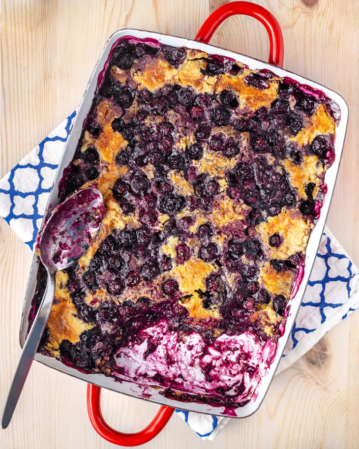 Blueberry Dump Cake in red baking dish