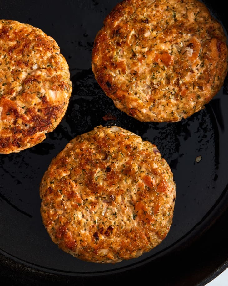 salmon burger patties in griddle