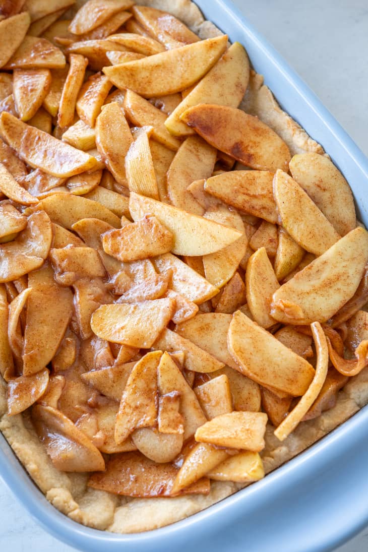 Step in making Apple Pie Bars - apples in baking pan