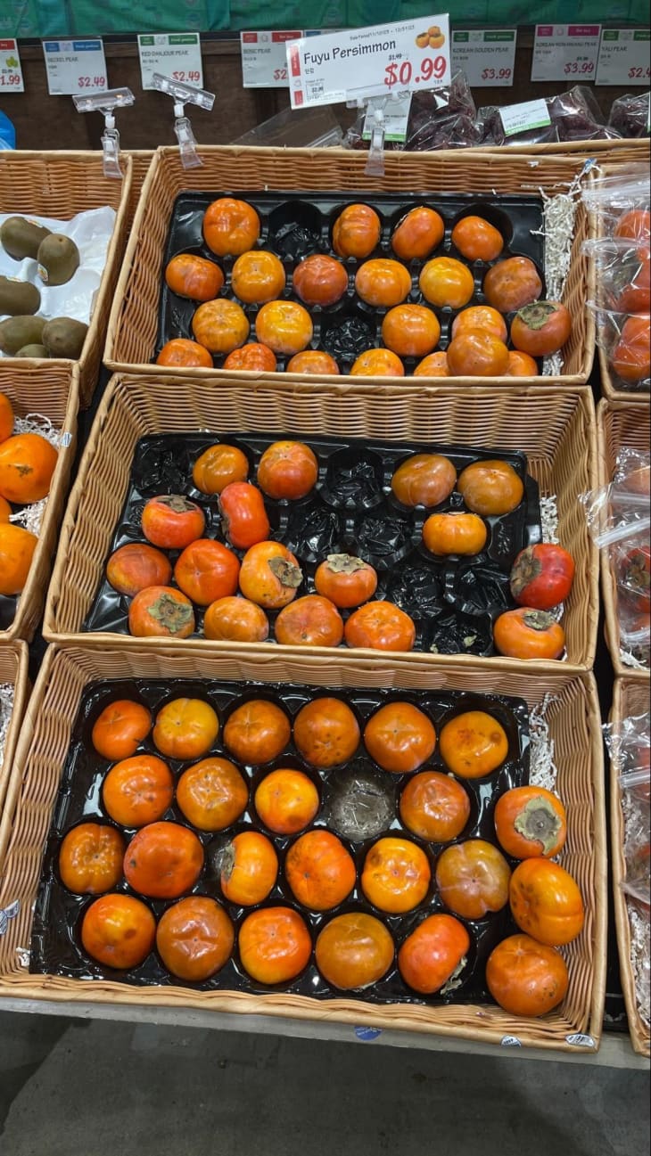 orange tomatoes in crates