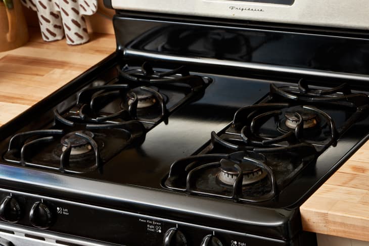 how to get black stuff off stove top