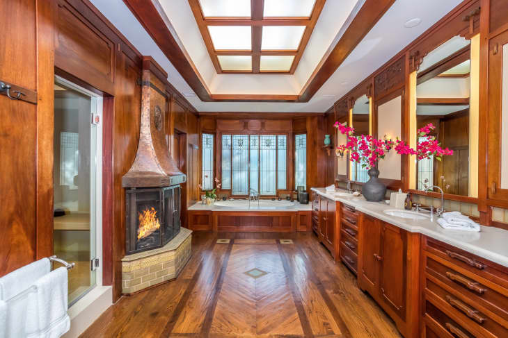 Bathroom with lots of wood detail inside of Jim Carrey's L.A home.