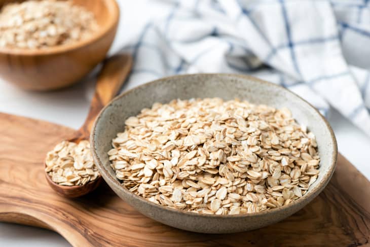 Dry oat flakes, oatmeal in a bowl. Healthy food