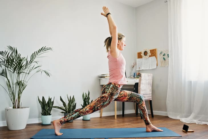 A woman is engaged in home fitness