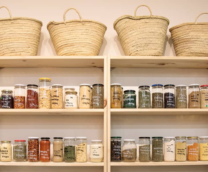Shelves with a selection of food in glass jars